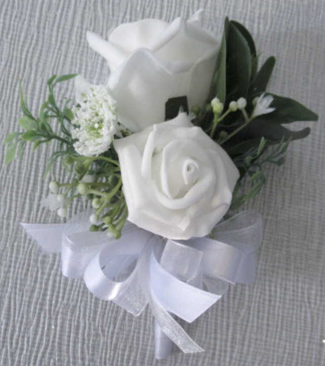 white rose corsage with greenery, white mother of the bride/groom corsage
